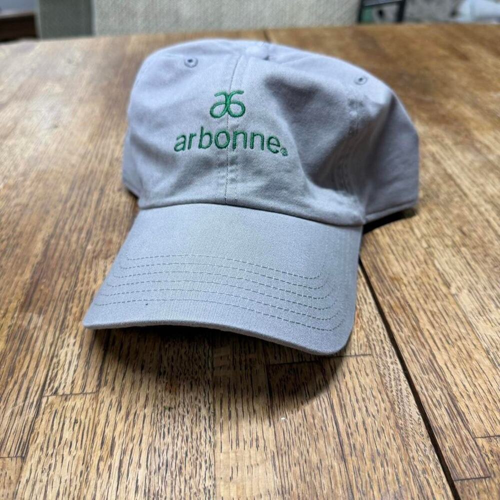 Arbonne grey baseball cap gifting